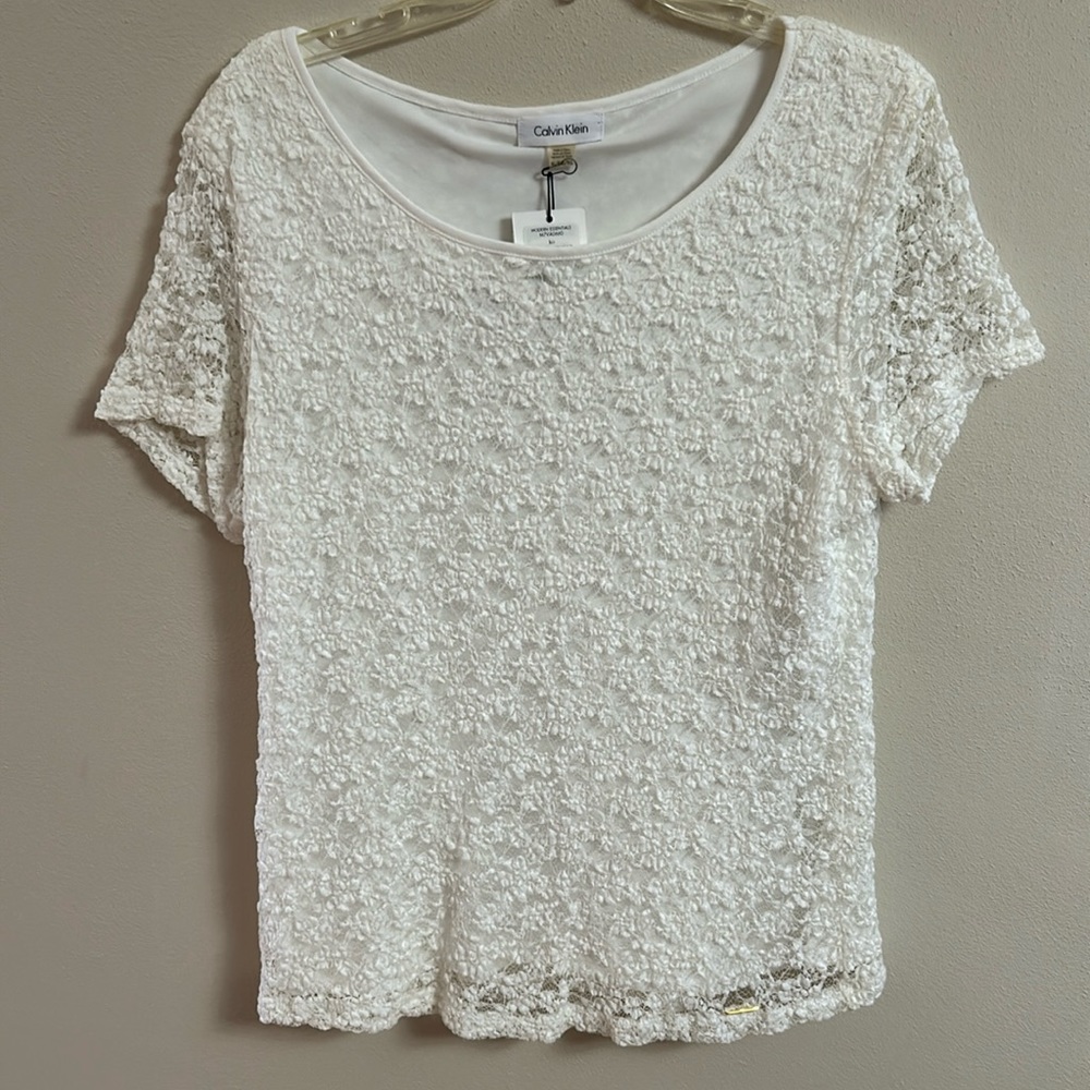Cream colored Calvin Klein blouse. Stretch lace, size Extra Large